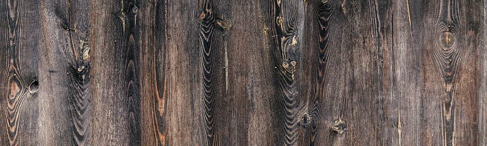 Planks of wood damaged by the aging process